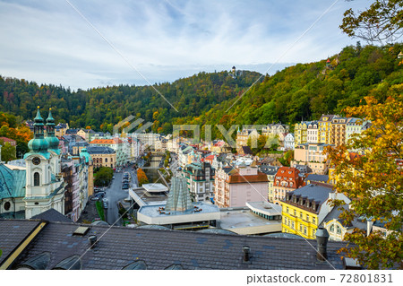 Karlovy Vary with church and hot spring colonnade, Czech Republic 72801831