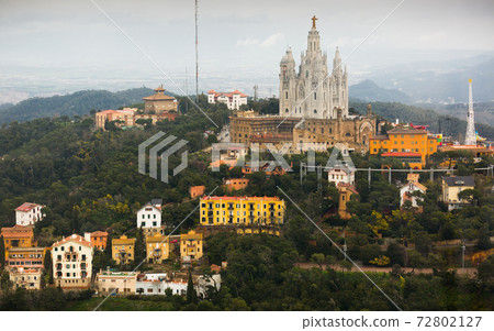 View of temple Expiatori del Sagrat Cor on Tibidabo mountain 72802127
