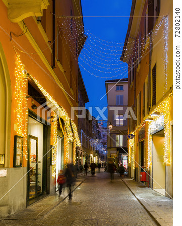 Night Christmas illumination of Parma in Italy 72802140