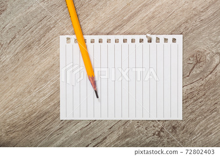 clean white sheet with pencil 72802403