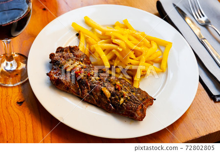 Grilled lamb with french fries, homemade dinner 72802805