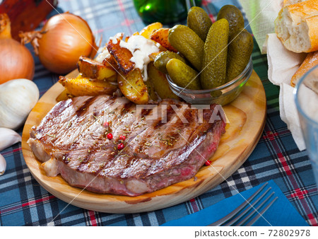 Grilled beef with fried potatoes Grilled beef with fried potatoes 72802978