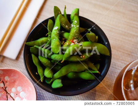 Edamame fresh soya beans close-up. Japanese cuisine Edamame fresh soya beans close-up. Japanese cuisine 72803005