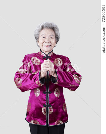 portrait of a senior woman in traditional chinese costume portrait of a senior woman in traditional chinese costume 72803592
