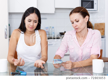 Girl asks cash Girl asks cash 72803853