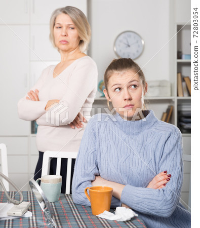 Adult daughter quarreled with her mother Adult daughter quarreled with her mother 72803954