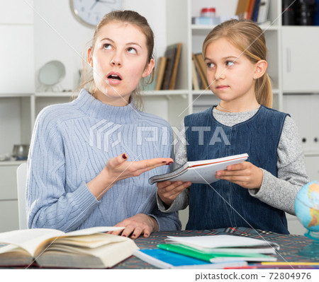 Woman complaining about her daughter Woman complaining about her daughter 72804976