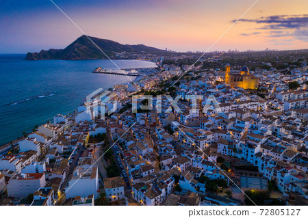 Aerial view of Altea cityscape on Mediterranean coast at twilight, Spain Aerial view of Altea cityscape on Mediterranean coast at twilight, Spain 72805127