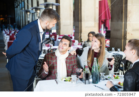 Positive company with restaurant manager 72805947