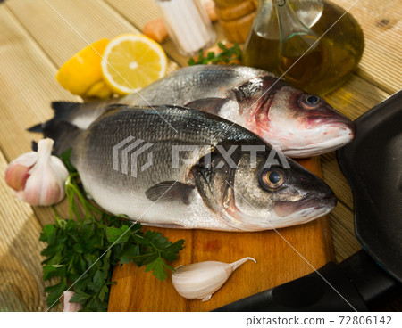 Two raw sea bass fish Two raw sea bass fish 72806142