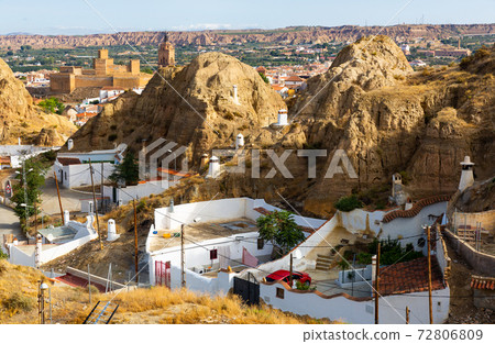 Neighborhood with troglodyte cave houses, Guadix, Spain Neighborhood with troglodyte cave houses, Guadix, Spain 72806809