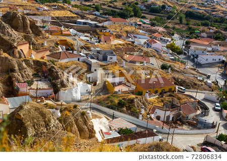 Neighborhood with troglodyte cave houses, Guadix, Spain Neighborhood with troglodyte cave houses, Guadix, Spain 72806834