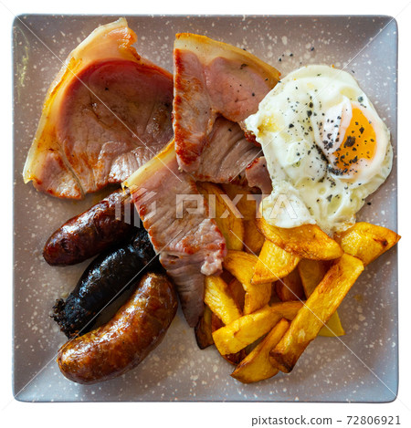 Fried pork with assorted Spanish sausages and potatoes 72806921