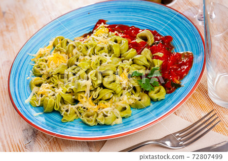 Italian spinach tortellini pasta with tomato sauce Italian spinach tortellini pasta with tomato sauce 72807499