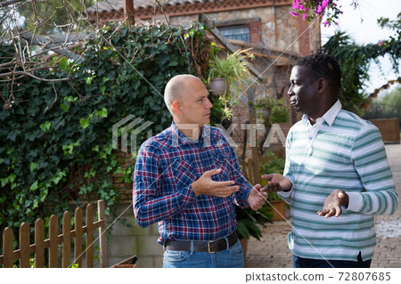 Conflict between neighbors in the country cottage Conflict between neighbors in the country cottage 72807685