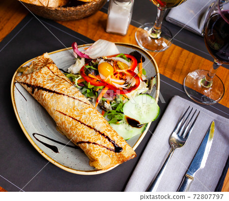 Crepes with vegetable salad and balsamic sauce Crepes with vegetable salad and balsamic sauce 72807797