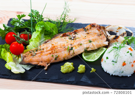 Fried trout fillets with rice, vegetables, lime Fried trout fillets with rice, vegetables, lime 72808101