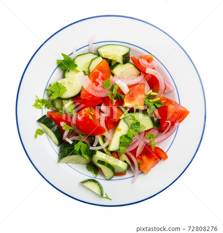 Fresh salad with cucumbers, tomatoes and onion 72808276