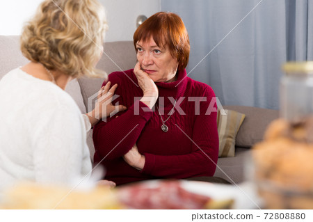 females quarreling in the room females quarreling in the room 72808880