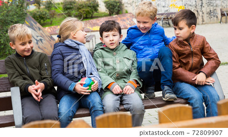 Happy kids talking Happy kids talking 72809907