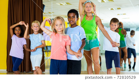 Little boys and girls dancing pair dance in the ballet studio 72810529