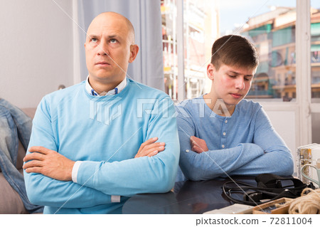 Father and son offended at each other Father and son offended at each other 72811004