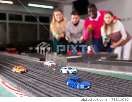 Models of race cars on track 72811082