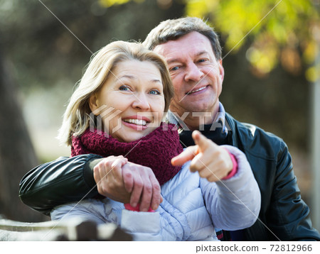 Couple spending time outdoors 72812966