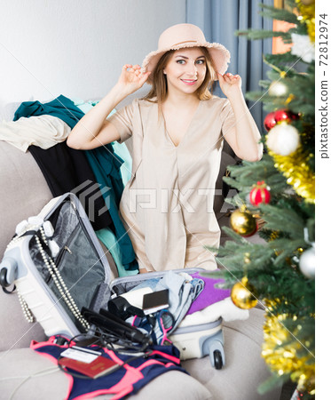 Girl packing bags Girl packing bags 72812974