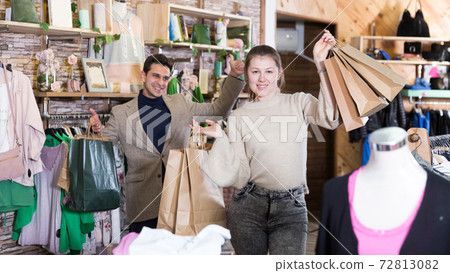 Couple is satisfied shopping Couple is satisfied shopping 72813082