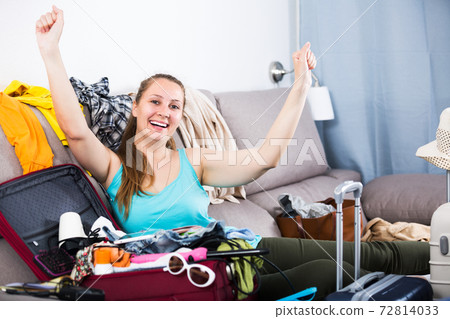 Woman getting ready for holidays Woman getting ready for holidays 72814033