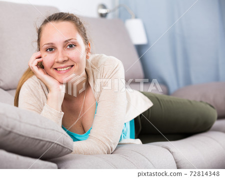 Woman posing playfully Woman posing playfully 72814348