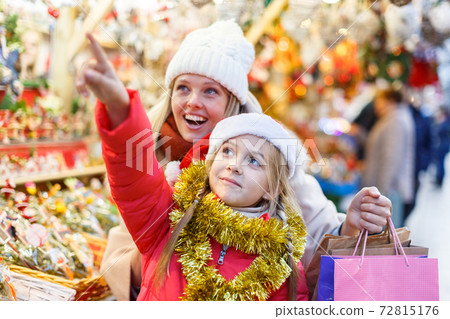 Happy family on Christmas market Happy family on Christmas market 72815176