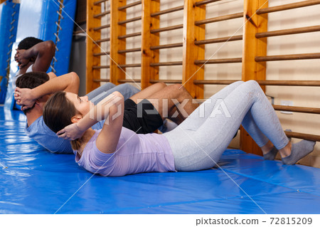 People warming up at gym People warming up at gym 72815209