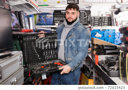 Fine man is choosing ratchet in store Fine man is choosing ratchet in store 72815423