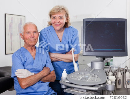 Portrait of mature man doctor and woman nurse Portrait of mature man doctor and woman nurse 72816082