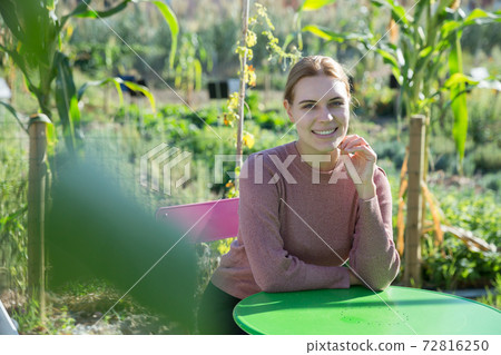 Portrait of cheerful woman farmer 72816250