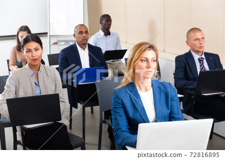 international group of managers with laptop in advanced training courses 72816895