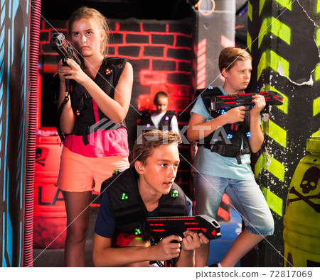 Teen kids during lasertag game 72817069