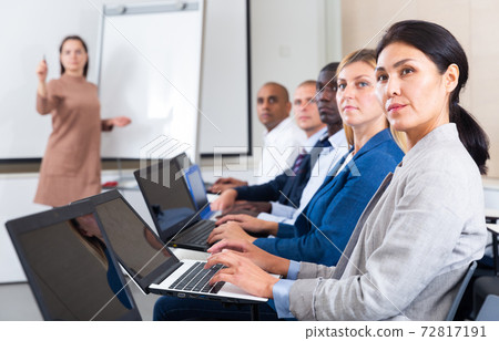 international group of managers with laptop in advanced training courses international group of managers with laptop in advanced training courses 72817191