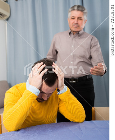 Adult father teaches his son Adult father teaches his son 72818301