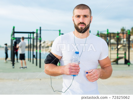 Portrait of man on sportsground Portrait of man on sportsground 72825062