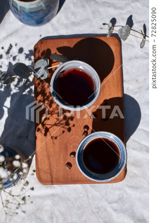 A cup of aromatic black coffee A cup of aromatic black coffee 72825090