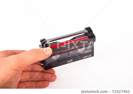 Small old MiniDV format video cassette, isolated on white background 72827462