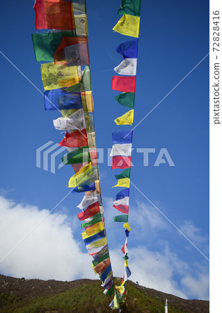 Nepal blue sky and prayer flag Nepal blue sky and prayer flag 72828416