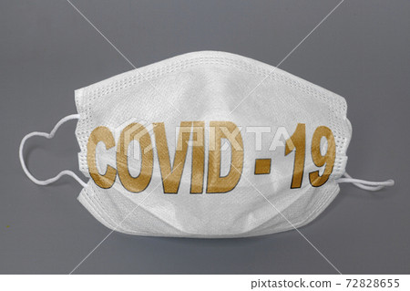 Medical protective mask with covid-19 text on grey background 72828655