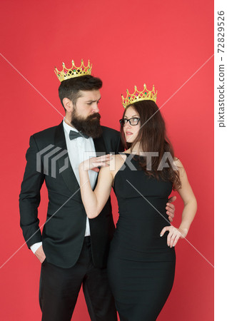 Crown as recognition. Proud couple wear crowns. Crown 72829526