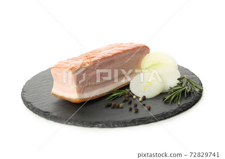 Tray with bacon and spices isolated on white background 72829741
