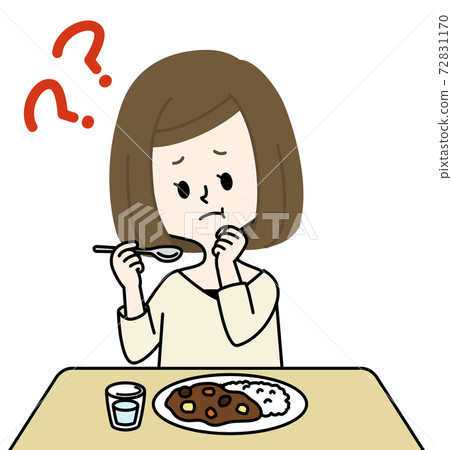 A woman shaking her neck while eating 72831170
