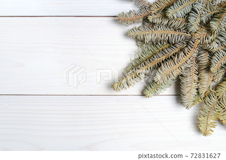 Christmas white wooden pattern with Christmas tree branches and toys Christmas white wooden pattern with Christmas tree branches and toys 72831627